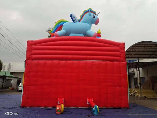 Kuda Pelangi Dua Saluran Paralel Slide Inflatable Dengan Pilar Bentuk Permen